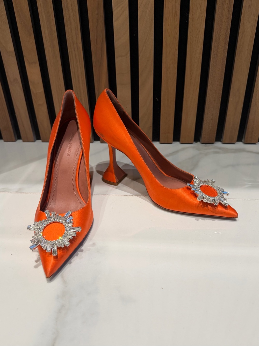 Amina Muaddi Orange Satin Pointed-Toe Pumps with Crystal Sunburst